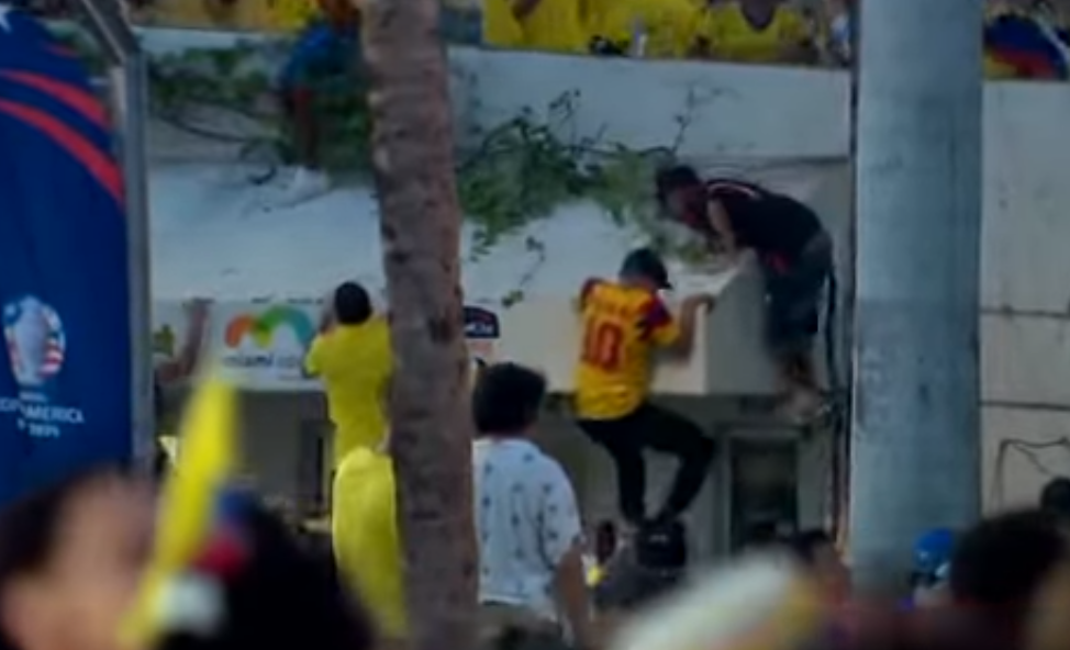 Fans Climbing Fences and Rooftops